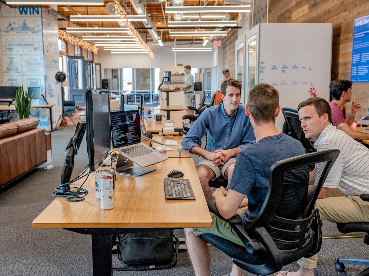 Recruiter and client discussing hiring needs